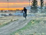 Falcon Pro electric dirt bike by 79Bike riding on a motocross track in Rexburg, Idaho near Rexburg Motorsport