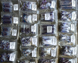 Individually packaged titanium Torx stem bolt kits labeled and organized for inventory and shipping.